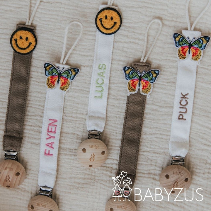 Speenkoord met naam - Bruin Smiley | Patchwork
