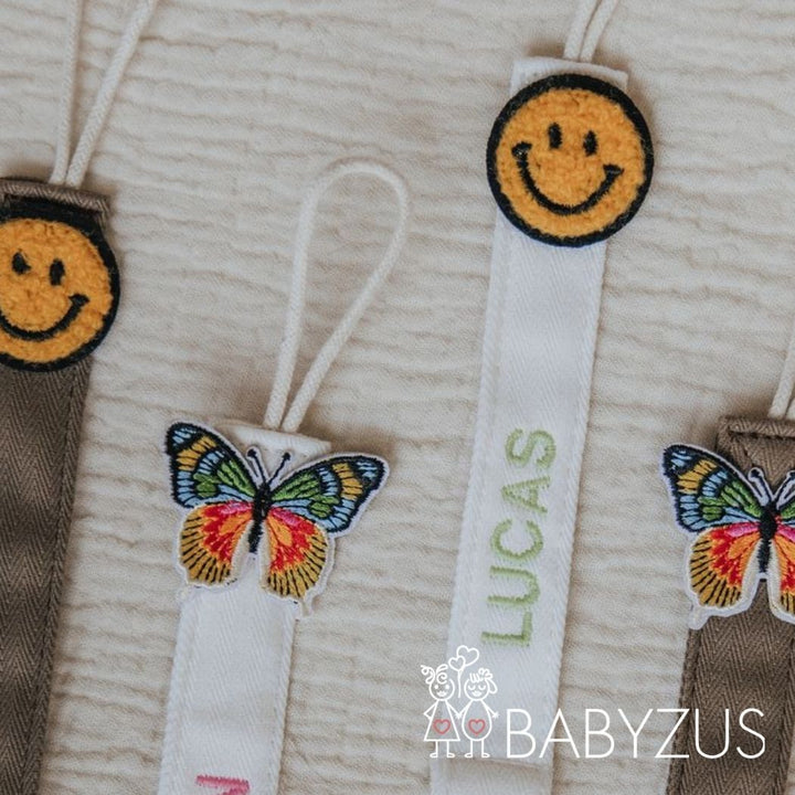 Speenkoord met naam - Bruin Smiley | Patchwork
