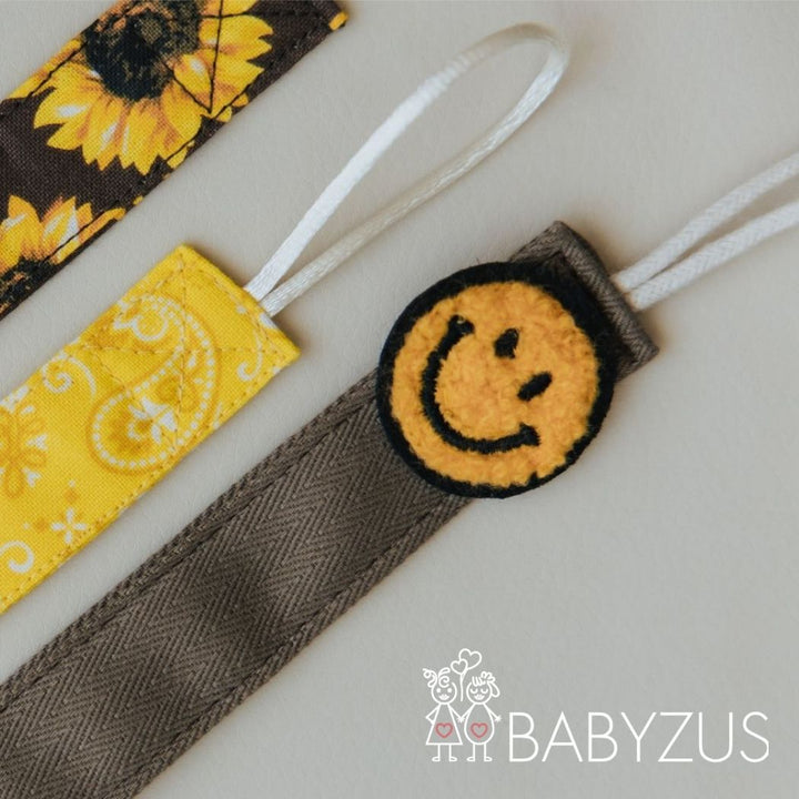 Speenkoord met naam - Bruin Smiley | Patchwork